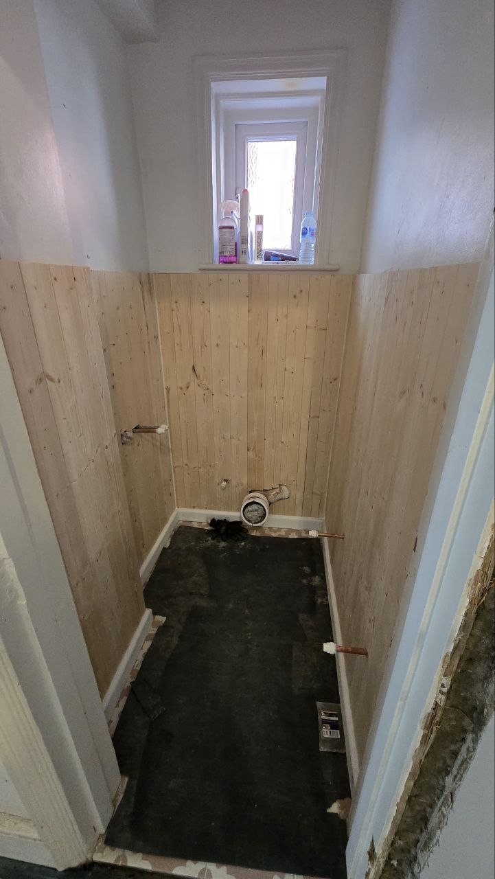 Cloakroom toilet renovation with patterned floor tiles